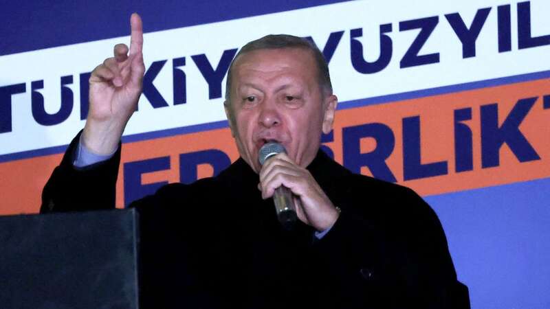 Turkish President Tayyip Erdogan addresses supporters at the AK Party headquarters (Image: AFP via Getty Images)