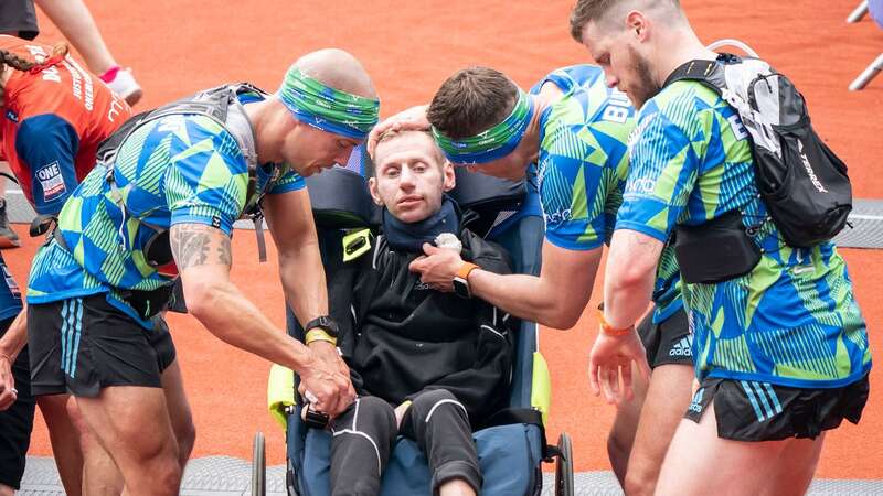 Rob Burrow after crossing the finish line of the 2023 Rob Burrow Leeds Marathon (Image: PA)