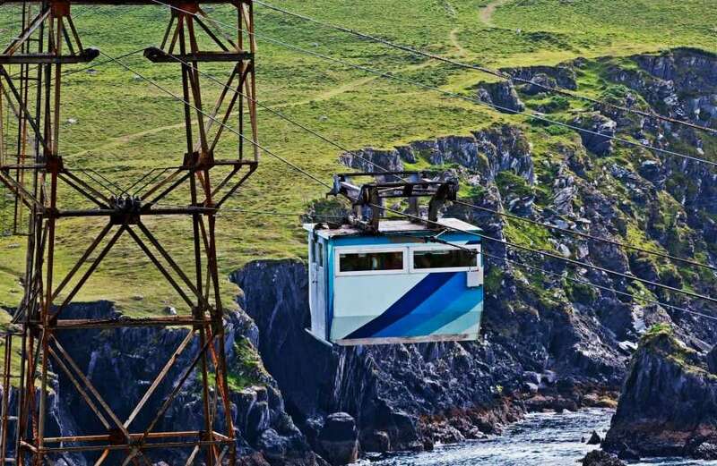 Island with only Irish cable car, whales & dolphins near most colourful village