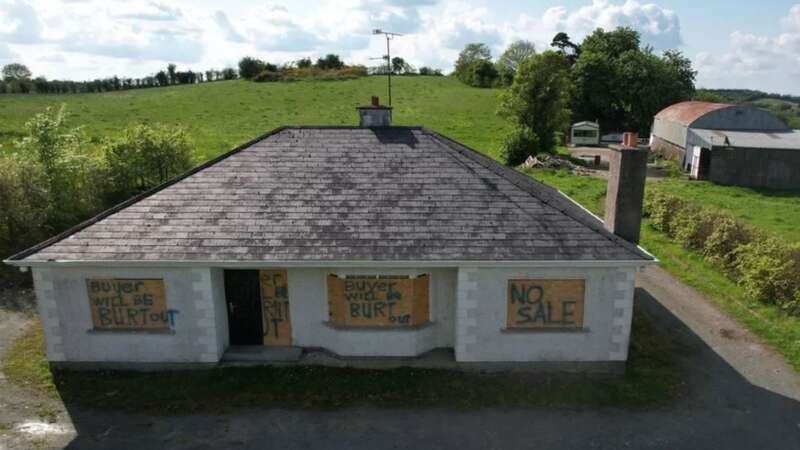 The threats scrawled across the bungalow