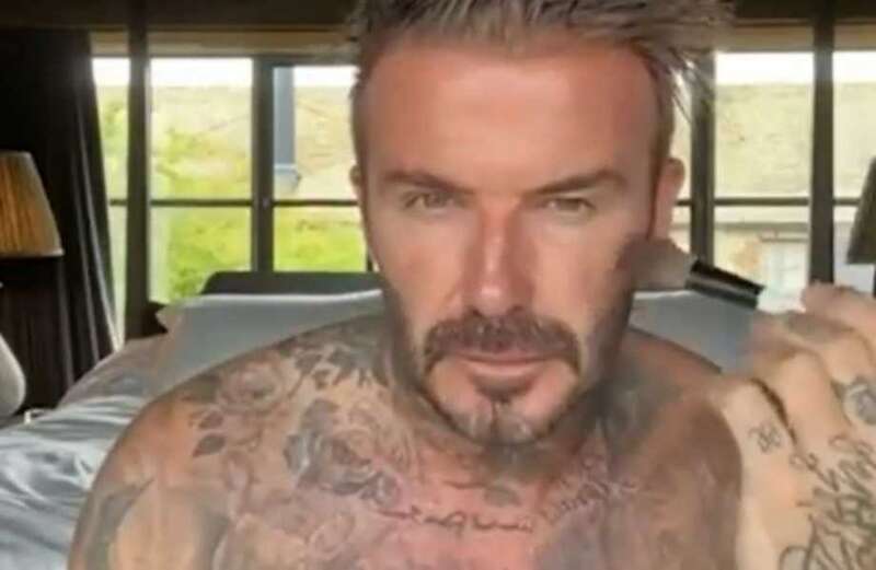 David Beckham strips topless and shows off his makeup routine in bizarre video