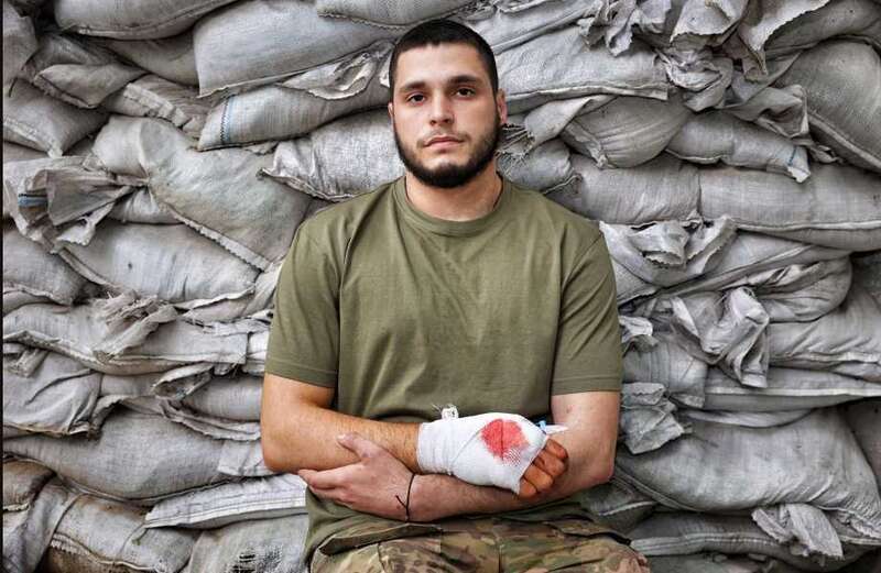 Ukrainian soldier who survived grenade blast vows to keep fighting Russians