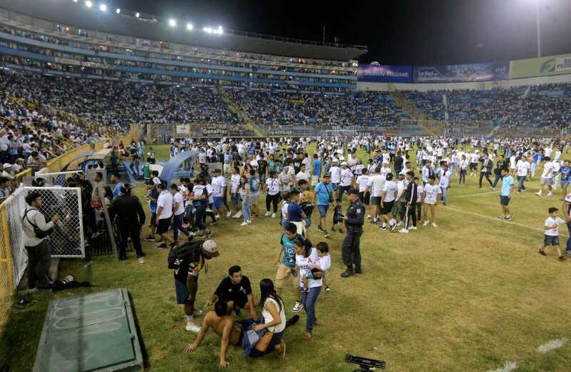 12 dead in stadium crush at football match as fans 'smothered' in stampede