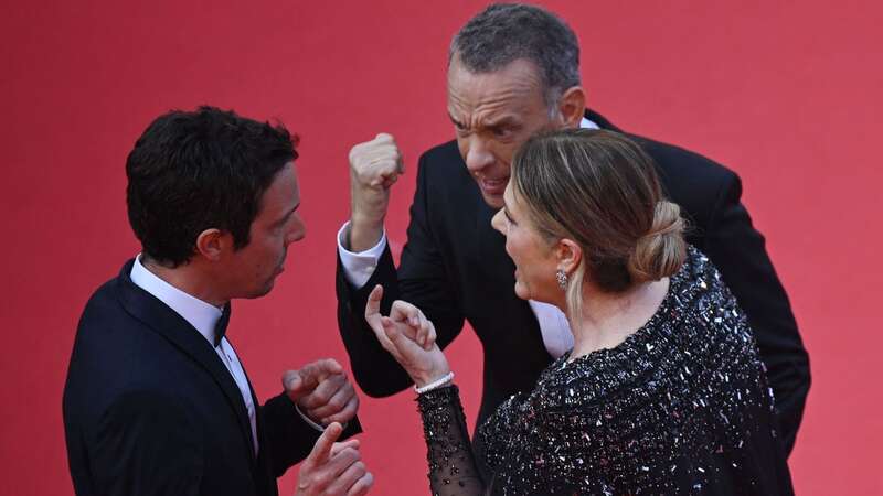 The Cannes film festival red carpet staffer has now spoken out (Image: AFP via Getty Images)