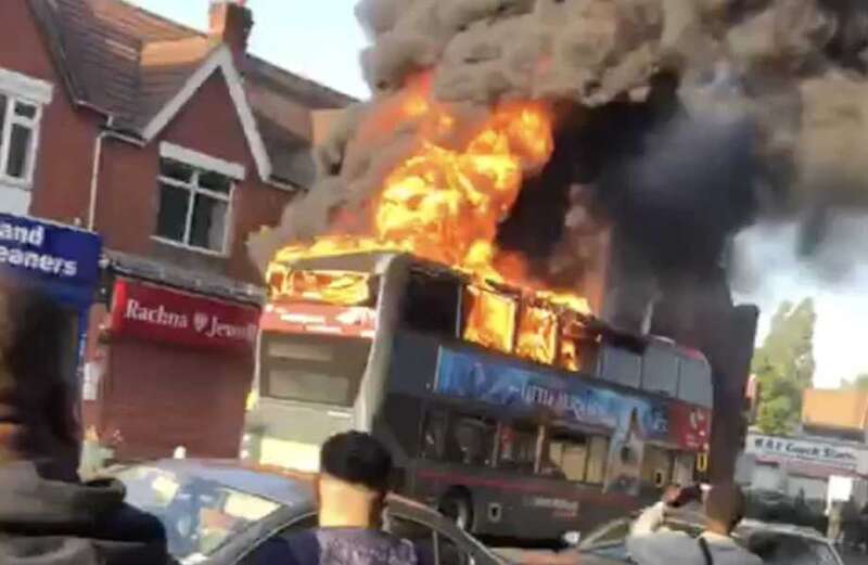 Watch as flames tear through double-decker bus after 'arson attack'