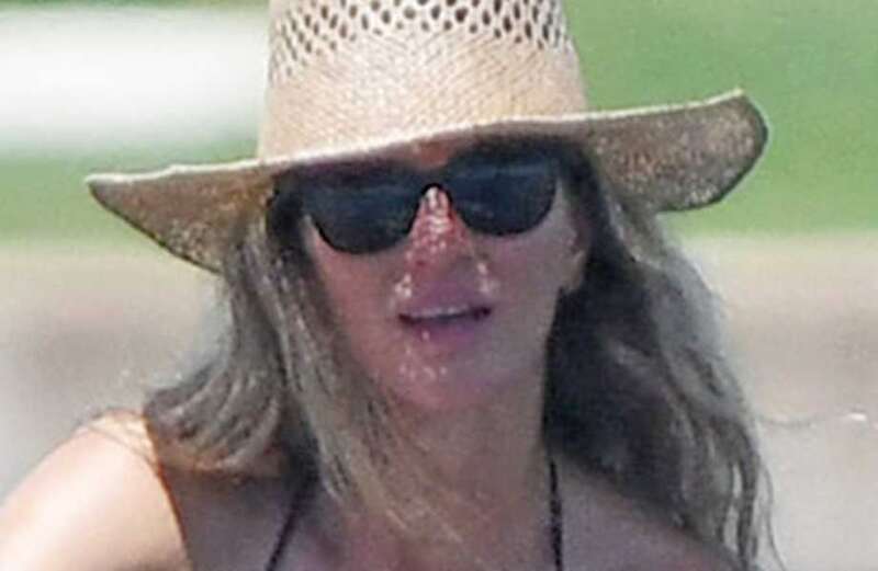 Gisele stuns in black bikini as she paddleboards with rumored new boyfriend