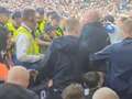 Moment Leeds United fans clash with police following relegation from Prem