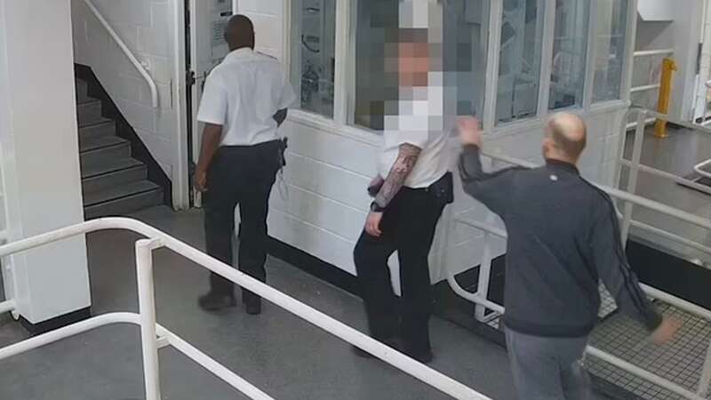 Chilling moment prisoner attacks guard after stalking him through jail