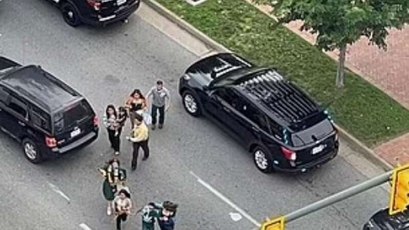 Attendees at the ceremony could be seen running from the scene (Image: Twitter)