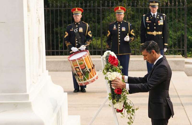 Sunak pays tribute at war memorial before crunch talks with Biden in US