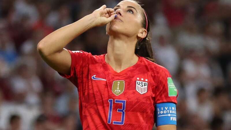 Alex Morgan celebrates after scoring the USA