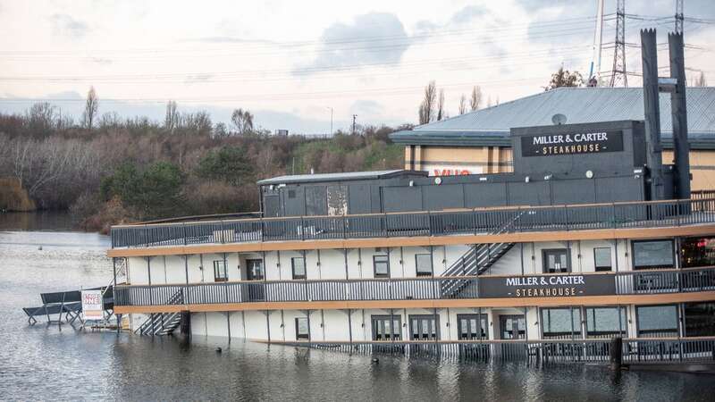 An urban explorer went inside the half sunken Miller & Carter steakhouse at Lakeside Shopping Centre in Essex (Image: SWNS)