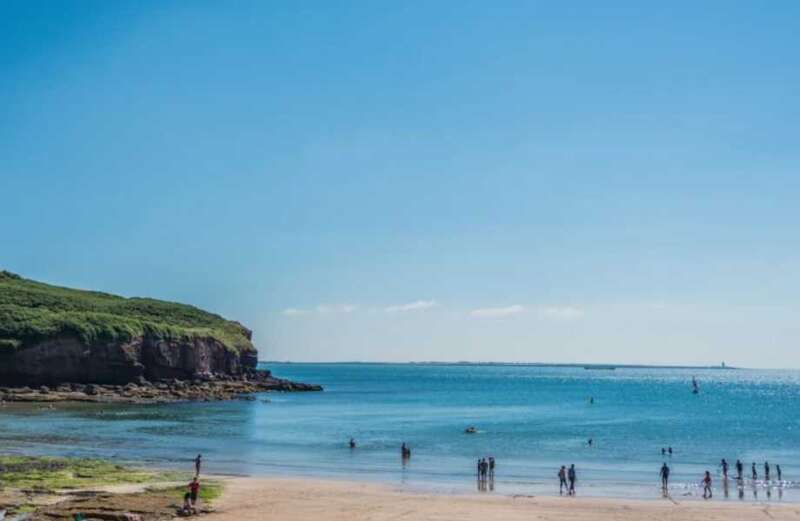 The Irish seaside town with water park, incredible cliff walks & sandy beaches