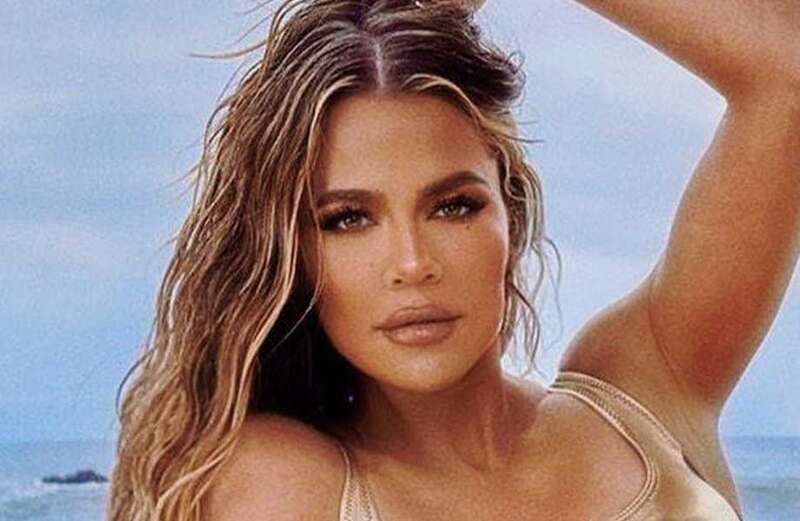 Khloe accused of 'painting on' muscle definition as she poses in bikini pics