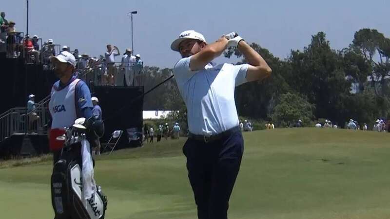 The ball ended up in the golf ball holder of a reporters cart