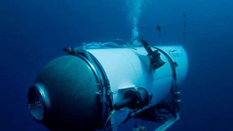 Search for Titanic submarine expanded as coastguard use underwater vehicles