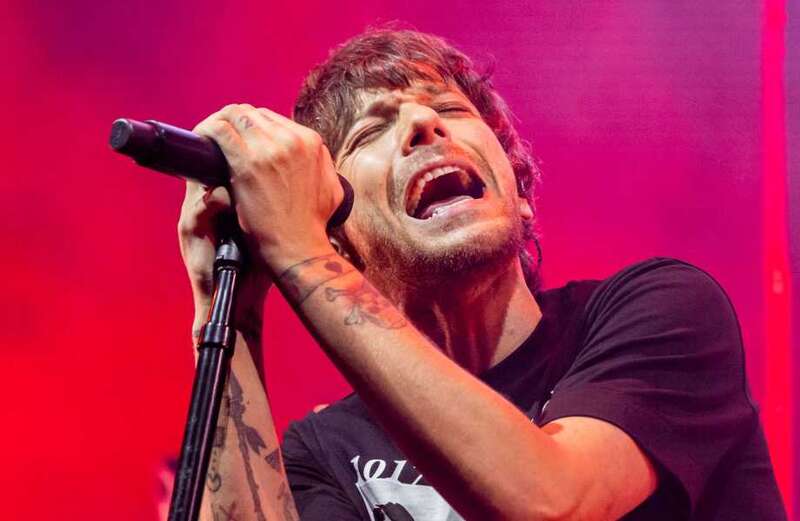 Louis Tomlinson fans flee concert with broken bones as hail pummels crowd