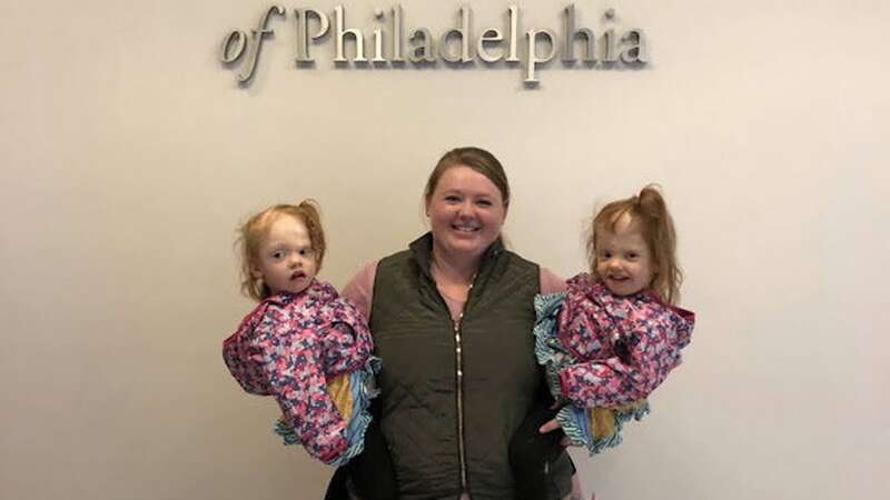 Earlier this month, they defied odds and graduated from kindergarten (Image: Heather Delaney / SWNS)