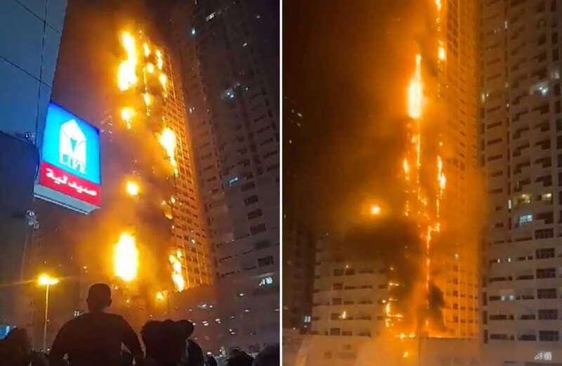 Moment skyscraper is engulfed in 400ft inferno as blazing debris rains down