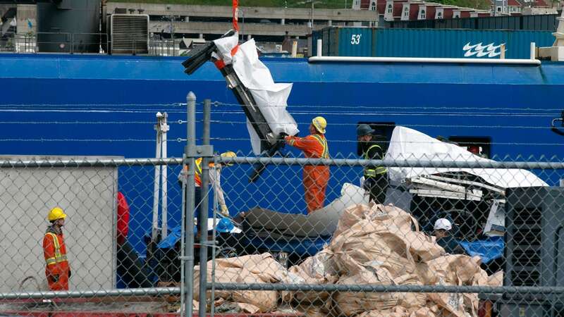 The debris from the Titan submersible being unloaded (Image: AP)