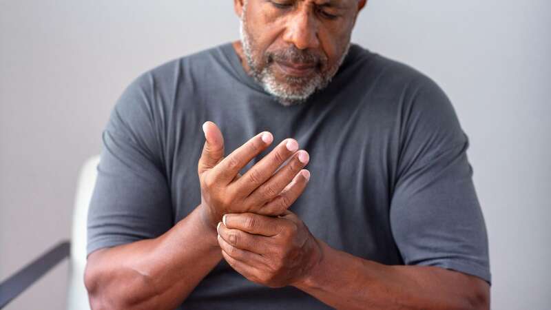 Skin next to the fingernail may also become more shiny than usual and nails could begin to curve downwards (stock image) (Image: Getty Images)