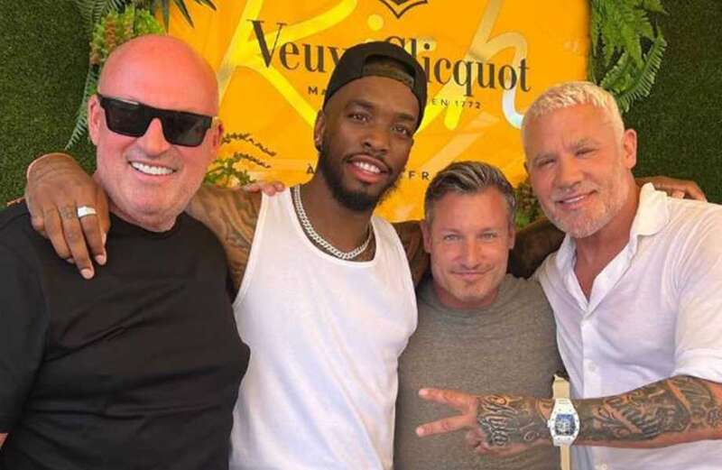 Ivan Toney poses with Wayne Lineker and an EastEnders legend in Ibiza