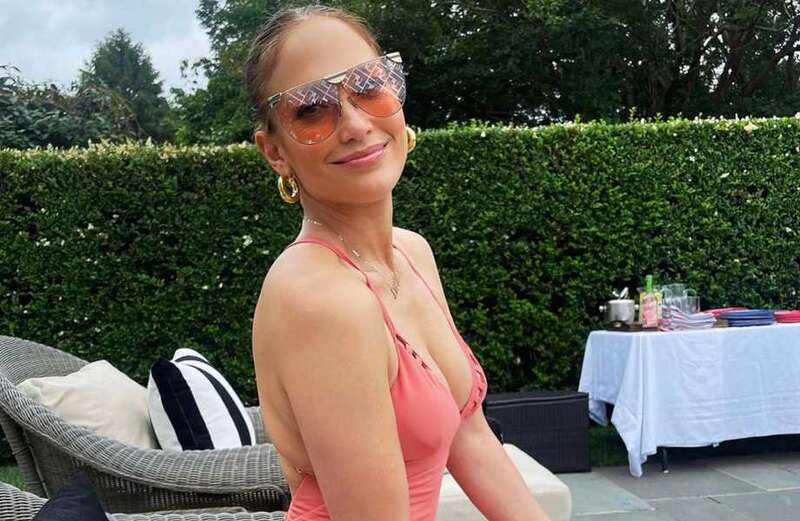 J-Lo, 53, stuns in pink swimsuit as she relaxes at a pool party