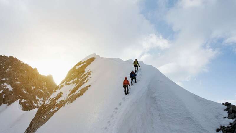 The man fell around 50 metres and was instantly killed (Image: Getty Images)