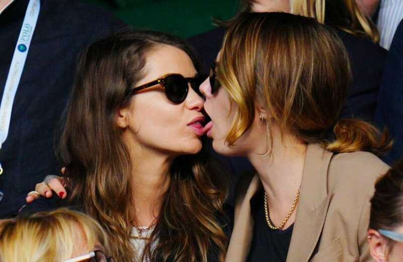 Cara Delevingne kisses her girlfriend at Wimbledon after Silverstone drama