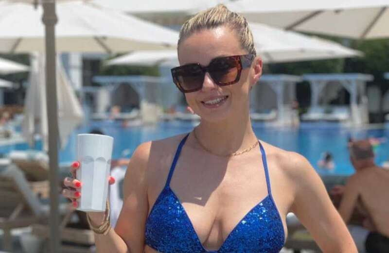 Ola Jordan shows off three stone weight loss in sparkly blue bikini