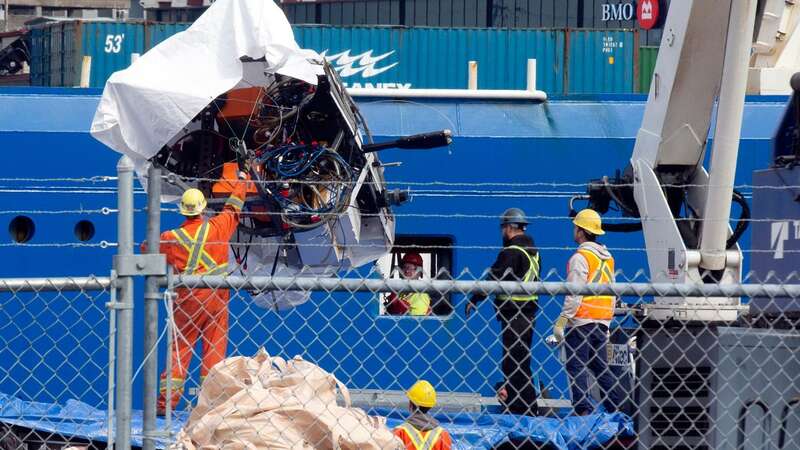 Debris from the Titan submersible is unloaded at the Canadian Coast Guard pier in St John