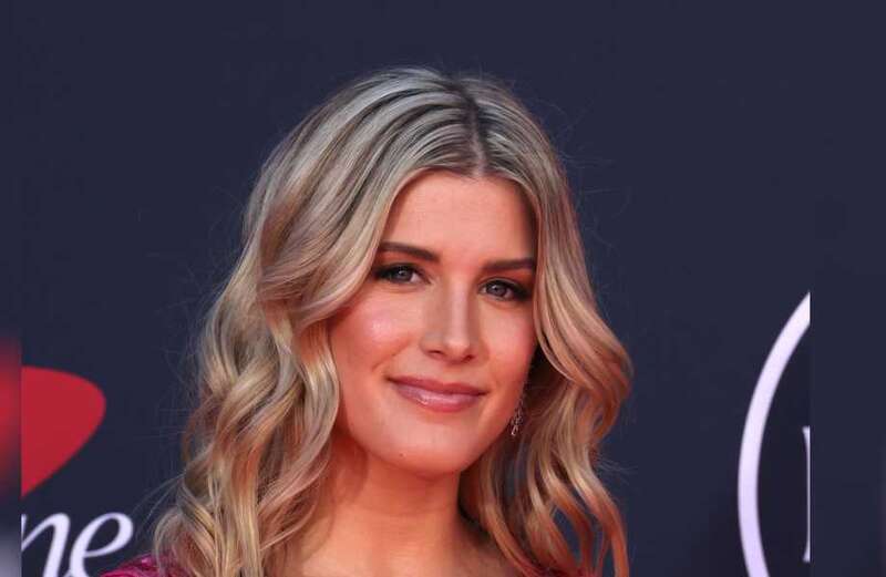 Ex-Wimbledon finalist Eugenie Bouchard stuns in pink dress at red carpet bash