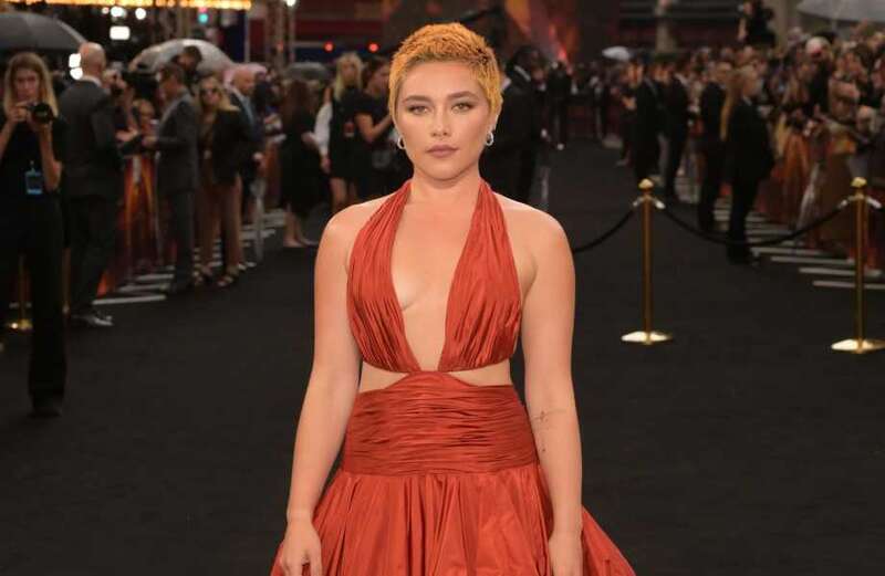 Florence Pugh goes braless in plunging gown at star-studded Oppenheimer premiere