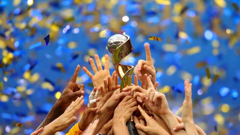 USA lift the trophy after victory in the 2019 FIFA Women