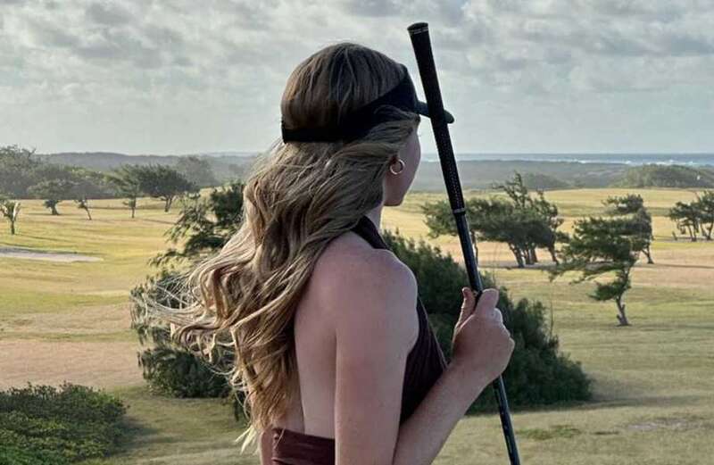 Charis suffers wardrobe malfunction as she offers 'golf with a view'