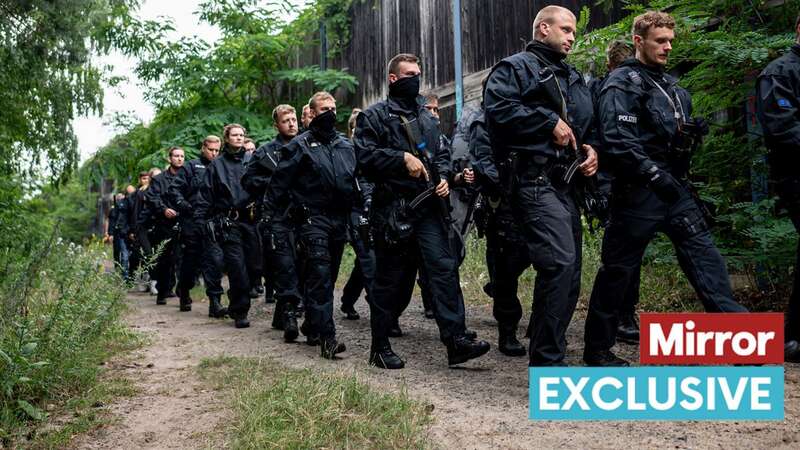 Brandenburg cops march as they prepare for Operation Lion Hunt (Image: Fabian Sommer/picture-alliance/dpa/AP Images)