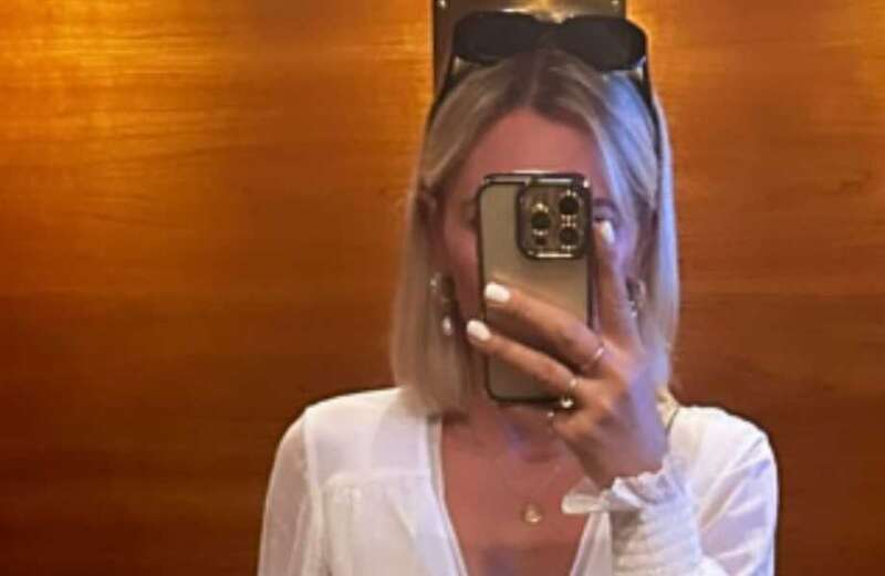 Danni Menzies goes braless as she sizzles in racy playsuit