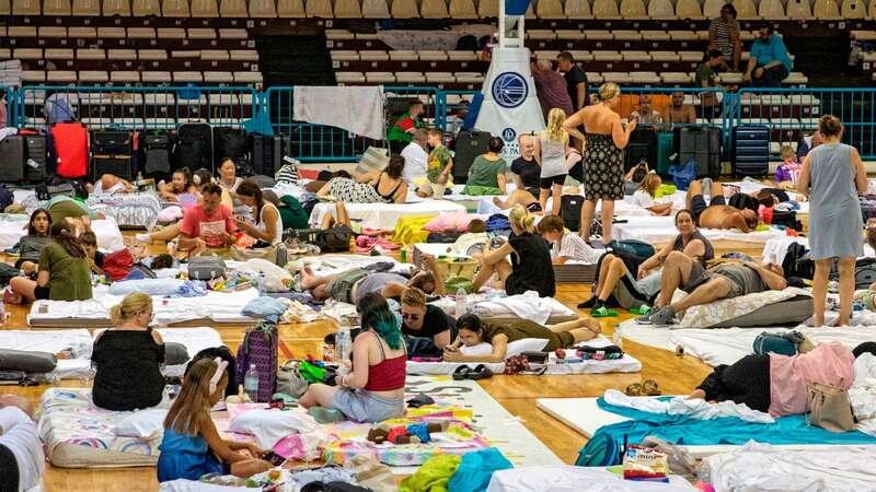 People evacuated from the wildfires have been allowed by authorities to stay in Venetokleion sports facility in Rhodes (Image: Intime News/Athena Pictures)