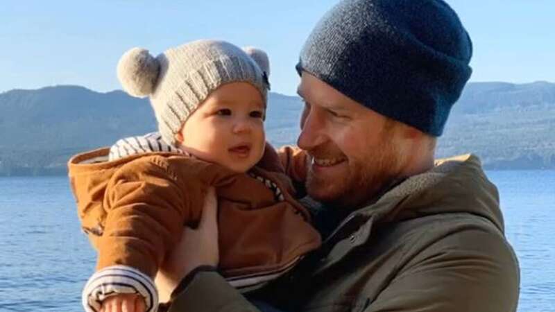 Prince Harry holding Archie after the Sussexes stepped down as senior royals for a new life in the US (Image: PA)