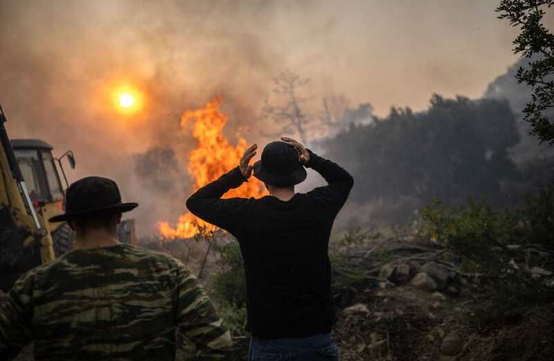 Rhodes declares 'state of emergency' over wildfires as Greece sounds alarm