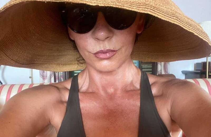 Catherine Zeta-Jones, 53, shows off her ageless figure in daring swimsuit