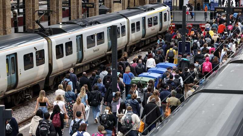 Passengers disembark at London