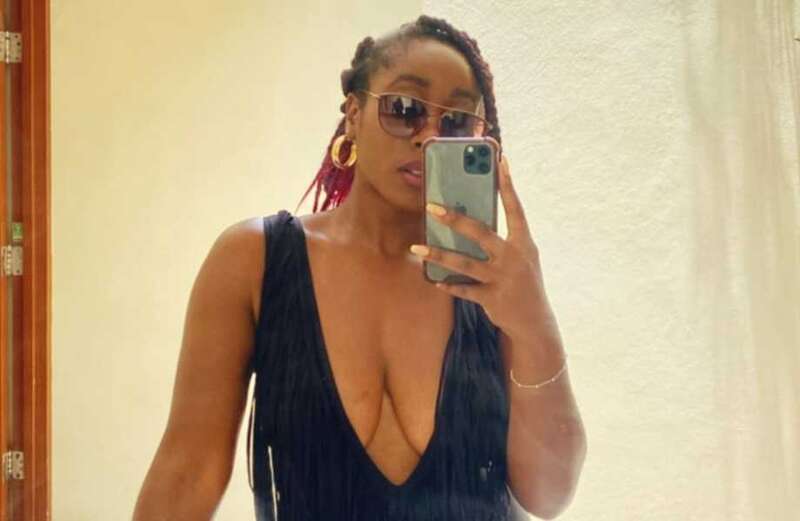 A Place in the Sun's Scarlette Douglas sets pulses racing in plunging swimsuit