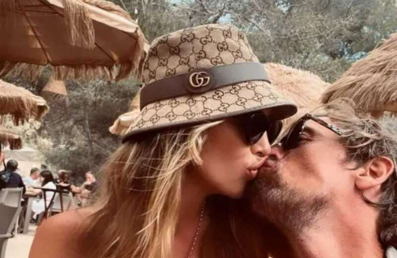 Abbey Clancy and husband Peter Crouch enjoy passionate kiss as on family holiday