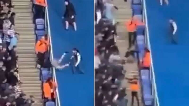 Peterborough yob falls over barrier attempting to spit at Reading fans