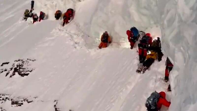 Footage showed the mountaineers climbing over Mohammad Hassan