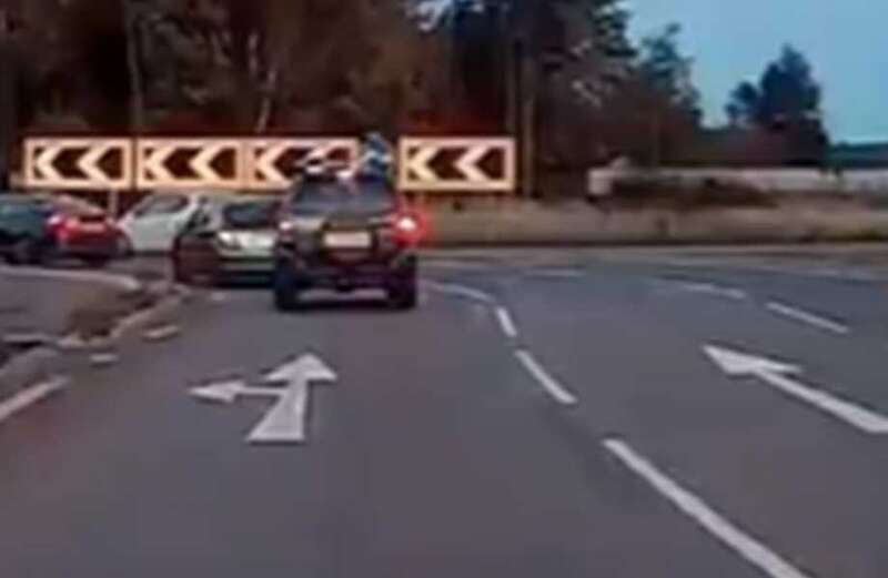 Watch as driver leaves motorists raging by using roundabout slingshot method