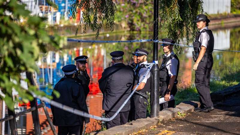 Police at the scene near the canal off Bulls Bridge Lane (Image: Marcin Nowak/LNP)