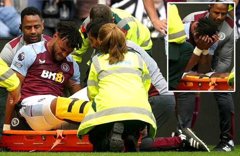 Aston Villa star Mings stretchered off in distress and in protective boot