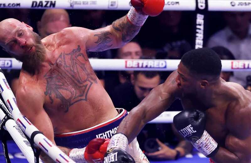 Laboured Joshua KOs Helenius with brutal punch after he's BOOED by O2 crowd